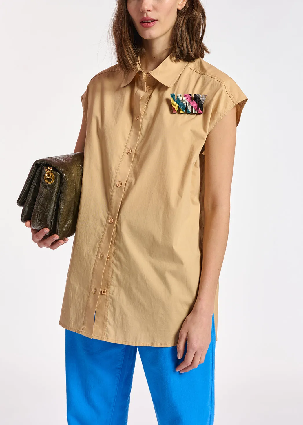 Beige sleeveless cotton shirt