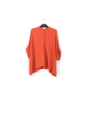 Orange boxy-cut seersucker shirt