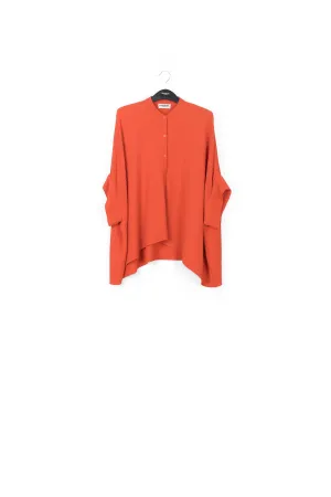 Orange boxy-cut seersucker shirt