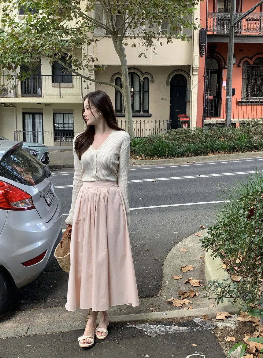 V-neck sweater and high waist pleated skirt set