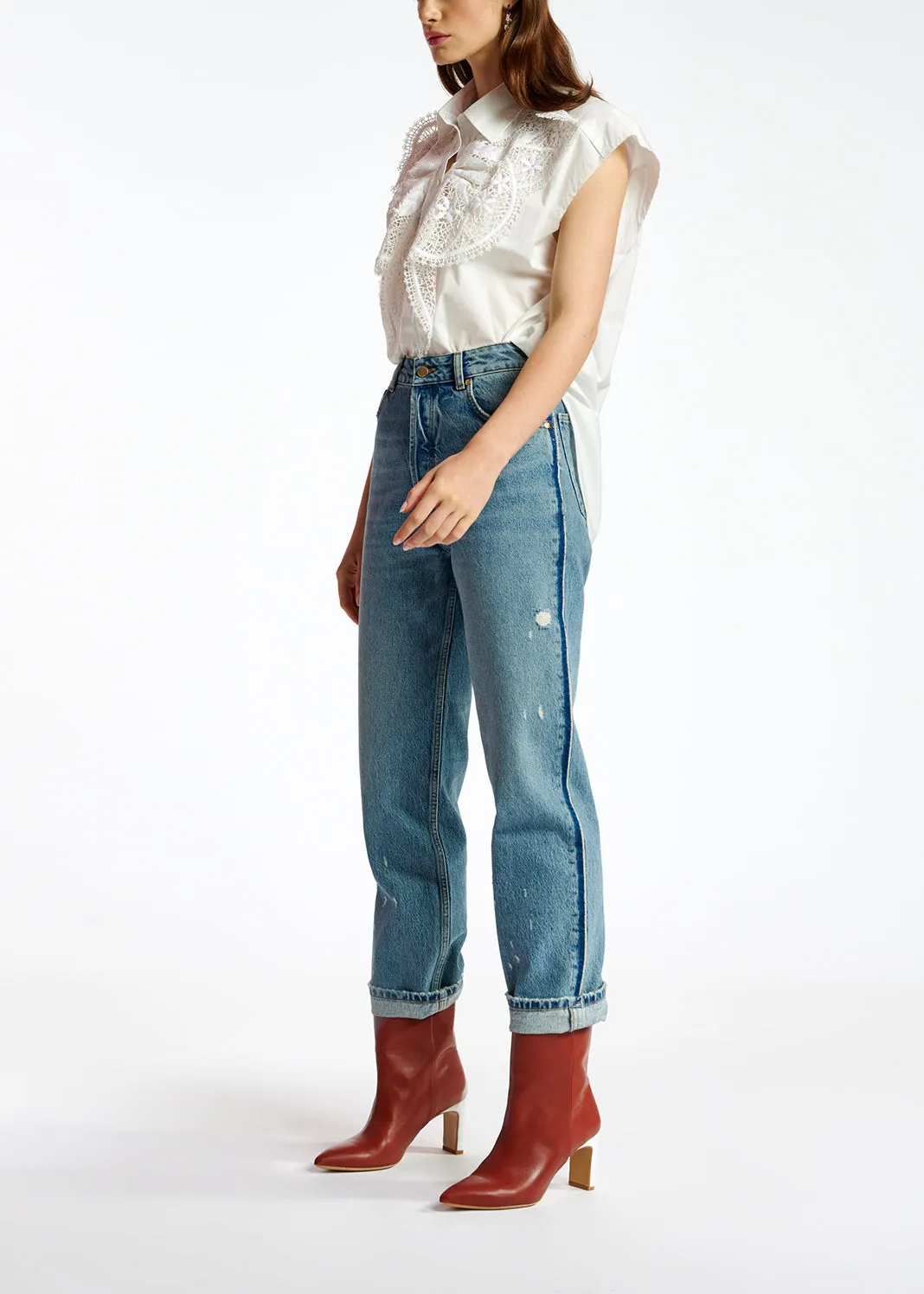 White cotton sleeveless shirt with lace embroidered trimmings