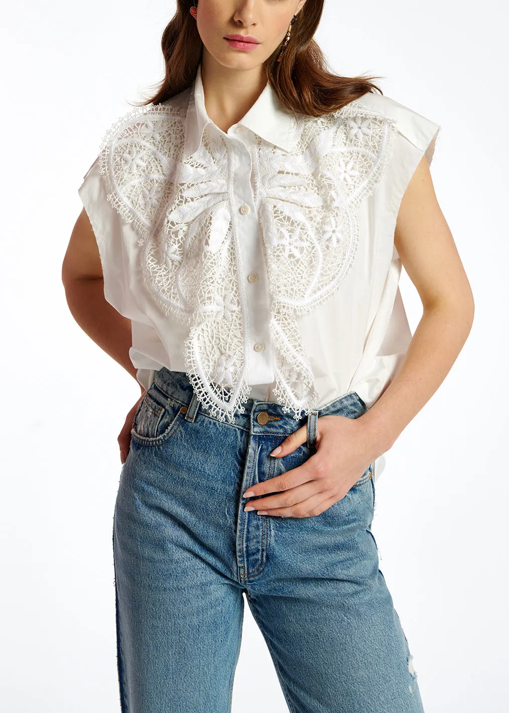 White cotton sleeveless shirt with lace embroidered trimmings
