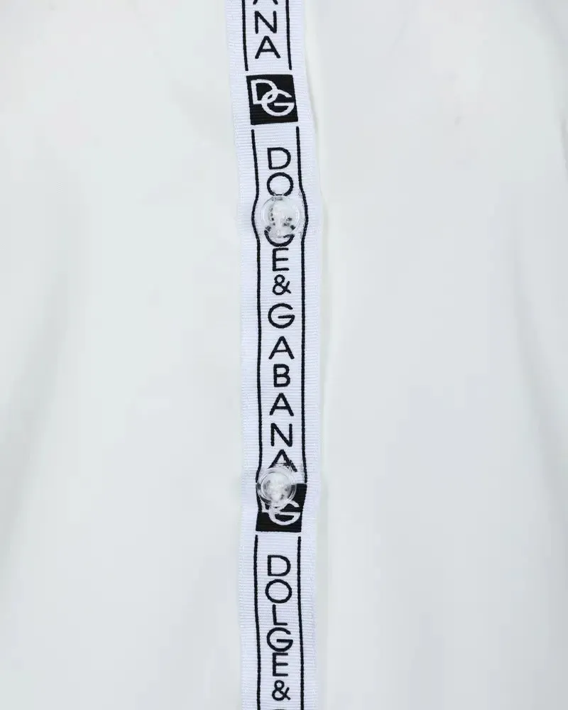 Xieyinshe - Long sleeve button down shirt with letter patch