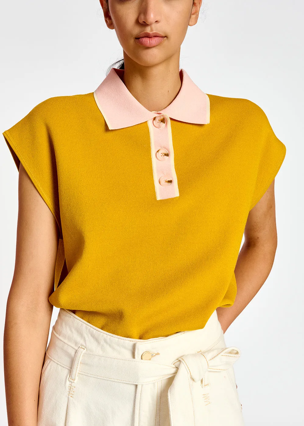Yellow sleeveless polo top with contrasting collar